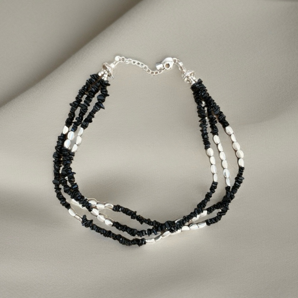 Elegant Black Onyx and Silver Beaded Twist Necklace